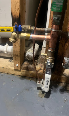 New copper supply lines and shutoff valves installed in utility room